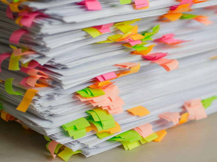 Case file with coloured tabs, prepared for the hearing